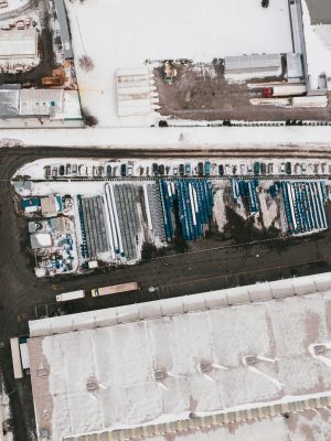 Aerial photograph of a snow-covered industrial facility in Poland during winter.